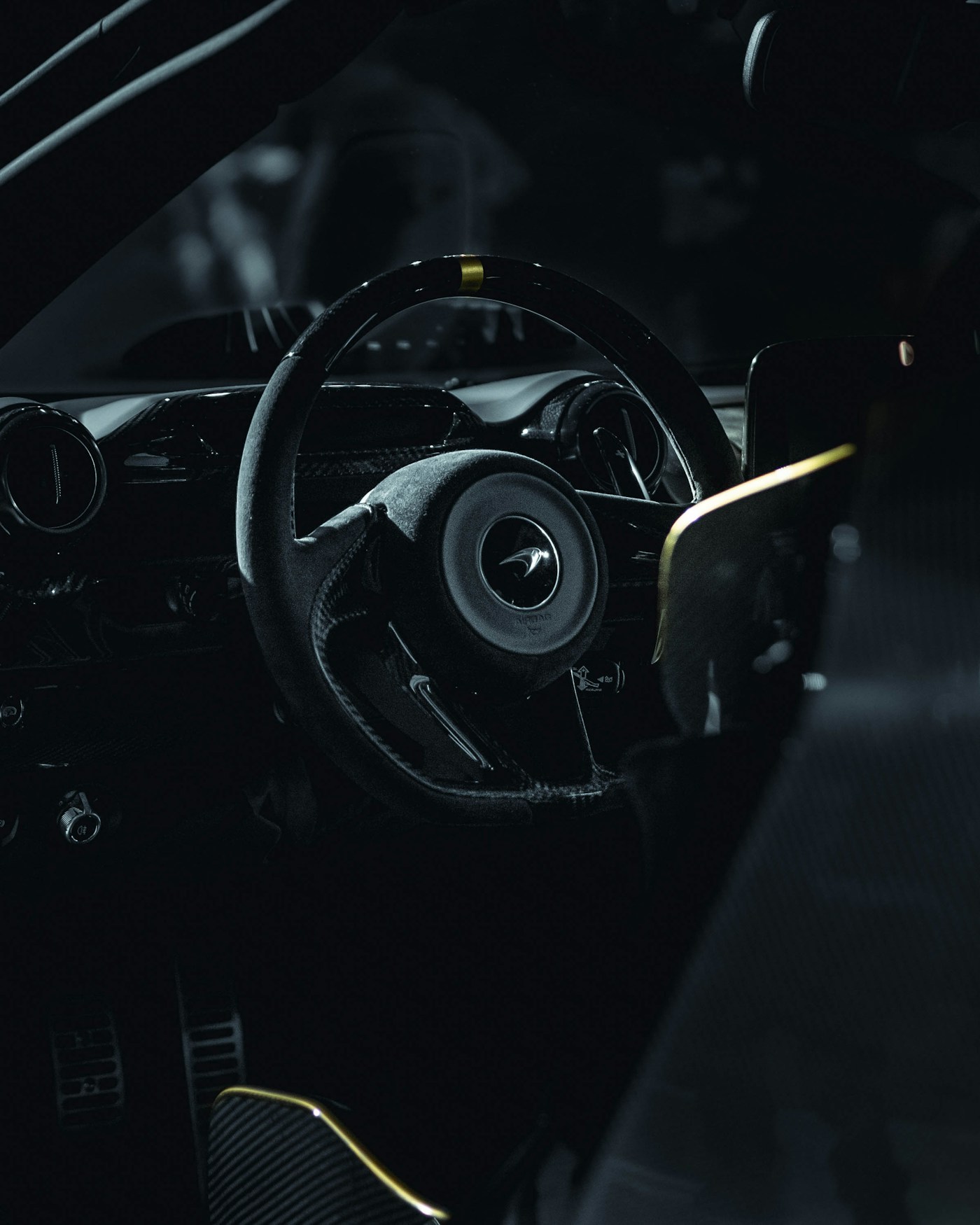 Steering wheel, upholstery, and carbon-fiber interior surfaces